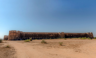 Naukot Fort is a fortification that was established by Mir Karam Ali Khan Talpur in 1814. It is situated in Mithi Taluka, Tharparkar District, 64 km in the south of Mirpur Khas town, Sindh - obrazy, fototapety, plakaty