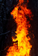 Flame of fire from a burning house as an abstract background