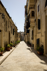 Fototapeta na wymiar A quaint street of Valletta, Malta.