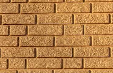 Wall of yellow bricks as an abstract background