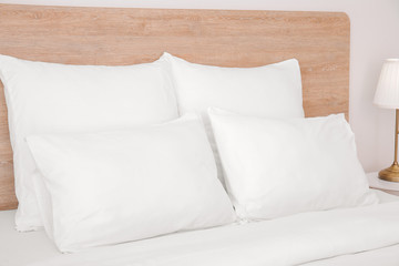 Fototapeta na wymiar Big comfortable bed in hotel room