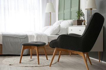 Interior of modern stylish room with armchair
