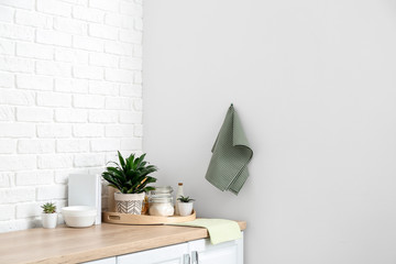 Set of utensils and products on kitchen counter