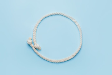 Long rope on color background