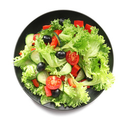 Plate with tasty cucumber salad on white background