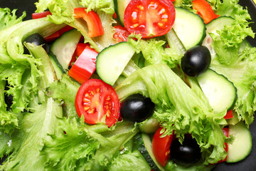 Tasty cucumber salad as background