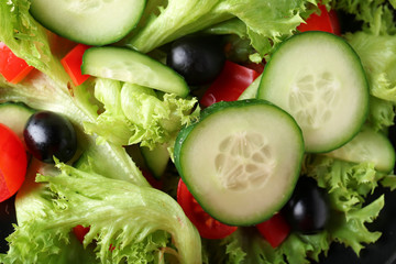 Tasty cucumber salad as background