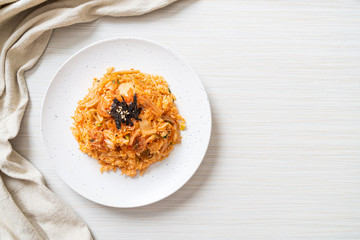 kimchi fried rice with seaweed and white sesame