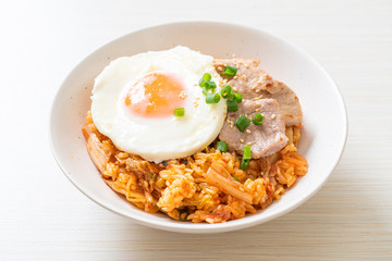 Kimchi fried rice with fried egg and pork
