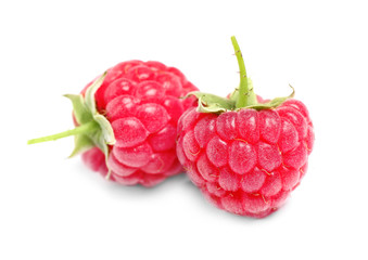 Delicious fresh ripe raspberries isolated on white