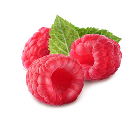 Fresh raspberries with green leaves on white background