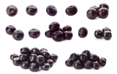 Set of fresh acai berries on white background