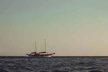 Fototapeta premium Greece. Rhodes island. Rest at the sea. Euro-trip. Sea water surface. Boats.