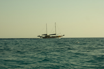 Fototapeta premium Greece. Rhodes island. Rest at the sea. Euro-trip. Sea water surface. Boats.
