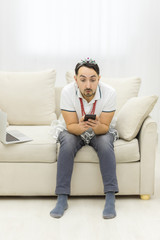 Obraz premium Photo of shocked surprised man looking with open mouth and big eyes.