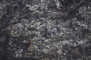 Close-up of dark stone texture