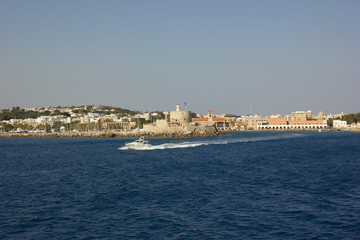 Naklejka premium Greece. Rhodes island. Rest at the sea. Euro-trip. Sea water surface. Boats.