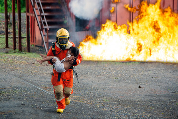 The firefighter was helping the girl. Leave the burning and smoky building.