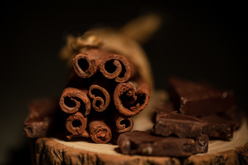 composition of coffee beans, shecolade, cinnamon and cocoa