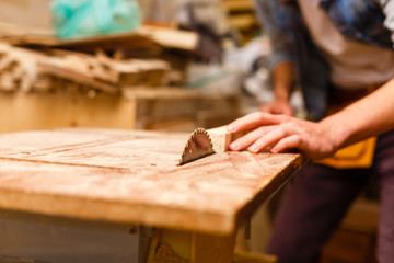 Image of mature carpenter in the workshop