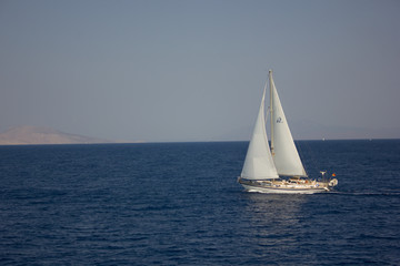 Fototapeta premium Greece. Rhodes island. Rest at the sea. Euro-trip. Sea water surface. Boats.