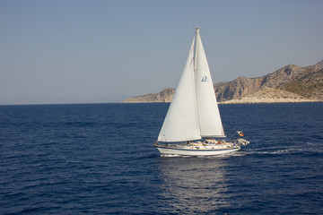 Obraz premium Greece. Rhodes island. Rest at the sea. Euro-trip. Sea water surface. Boats.