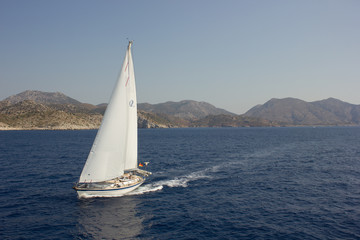Fototapeta na wymiar Greece. Rhodes island. Rest at the sea. Euro-trip. Sea water surface. Boats.