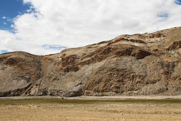 View of the mountain with dramatic sky in Tibet, China. 