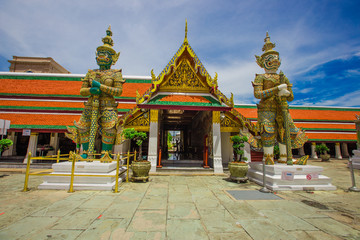 Naklejka premium Temple of the Emerald Buddha - Wat Phra Si Rattana Satsadaram / Wat Phra Kaew-Bangkok: June 13, 2020, tourists visit to see the beauty of The Grand Palace, in Phra Nakhon District, Thailand.