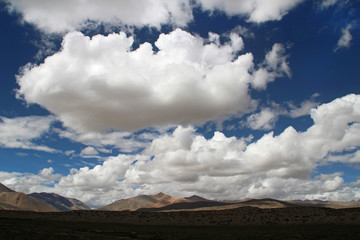 View of the mountain with dramatic sky in Tibet, China. 