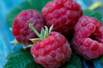 Raspberry berries close-up.
Natural background. Horizontal, nobody, free space. Agriculture concept.