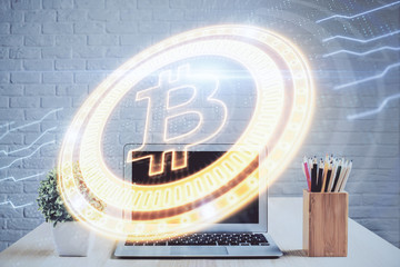 Double exposure of blockchain and crypto economy theme hologram and table with computer background....