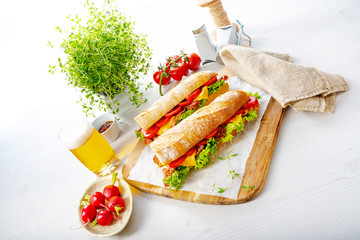 crispy baguette with bacon, tomatoes and cheese