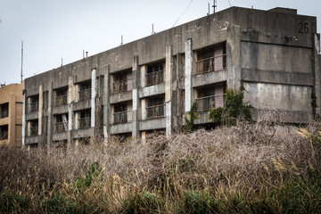 Fototapeta na wymiar Crumbling Ikeshiima Apartment Blocks