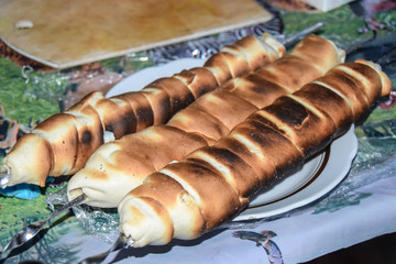 khachapuri kebab fried cheese on skewer in dough