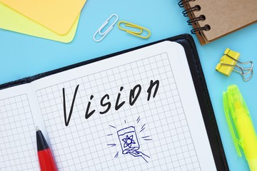 Financial concept meaning Vision with sign on the sheet.