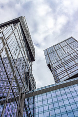 Fototapeta premium View from the bottom of the tower-skyscrapers 'City of capitals'