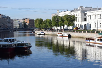 Naklejka premium pleasure boat on the canal