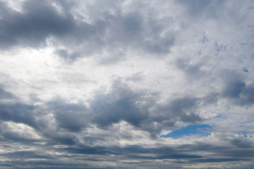 Obraz premium Aerial view white clouds in blue sky. View from drone. Aerial bird's eye view. Aerial top view cloudscape. Texture of clouds. View from above