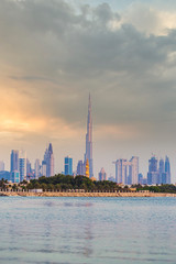 Dubai skyline lakeview during cloudy sunset