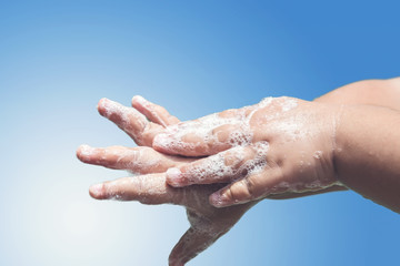 Fototapeta premium Cleaning and washing hands with soap prevention for outbreak of corona virus covid-19. Corona virus or COVID-19 pandemic prevention