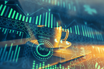 Computer on desktop in office with technology theme hologram. Double exposure. Tech concept.