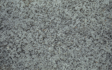 Closeup fragment of grunge weathered wall of a building