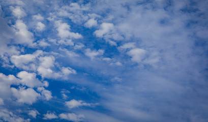 The vast blue sky and clouds sky. Luxury blue sky background with tiny clouds.