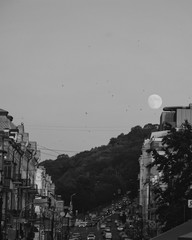 Moon over the city, downtown, architecture, historic buildings 
