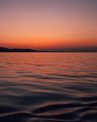 sunset over the sea, orange sunset, beautiful orange sky and sea