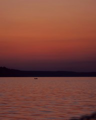 sunset on the lake, beautiful landscape of the orange sunset and sky 