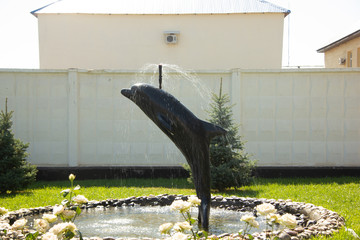 Fountain in Sol-Iletsk, Russia. Travel across Russia. Black Dolphin.