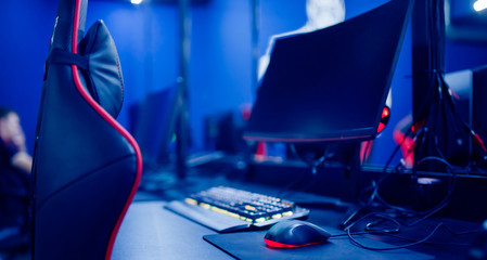 Professional workplace of an online game streamer, e-sportsman. Computer chair, gaming keyboard and...