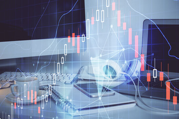 Forex market graph hologram and personal computer on background. Double exposure. Concept of investment.
